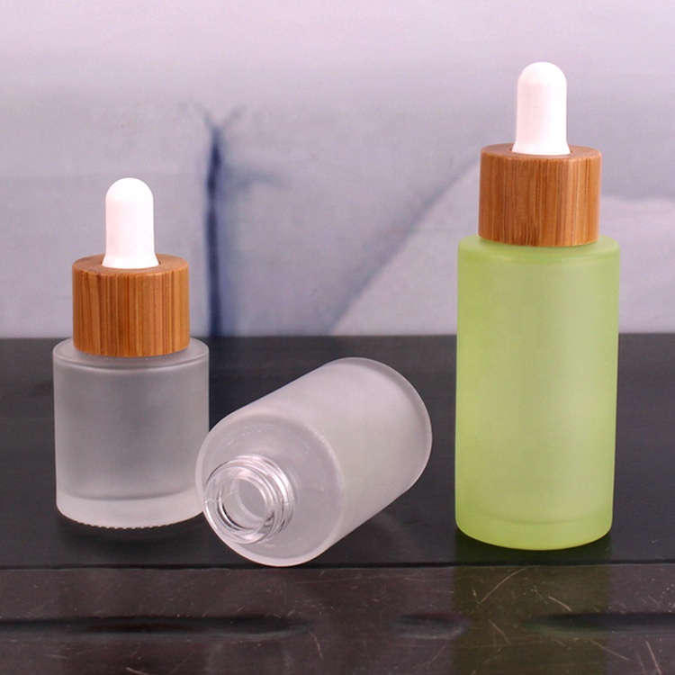 Frosted logo printing 30ml glass dropper bottle for cosmetic oil with bamboo lid