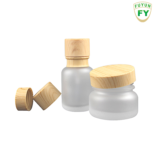 Fuyun In stock 50ml bamboo cap packaging frosted glass pump bottle
