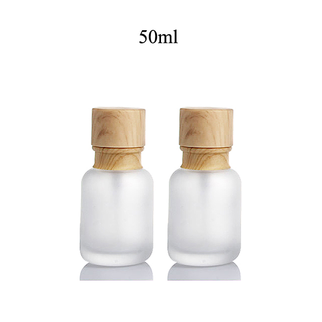Fuyun Quick Shipping Luxury Frosted 50ml Cosmetic Empty Lotion Glass Pump Bottle with Bamboo Lid