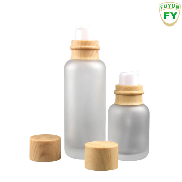 Fuyun Quick Shipping Luxury Frosted 50ml Cosmetic Empty Lotion Glass Pump Bottle with Bamboo Lid