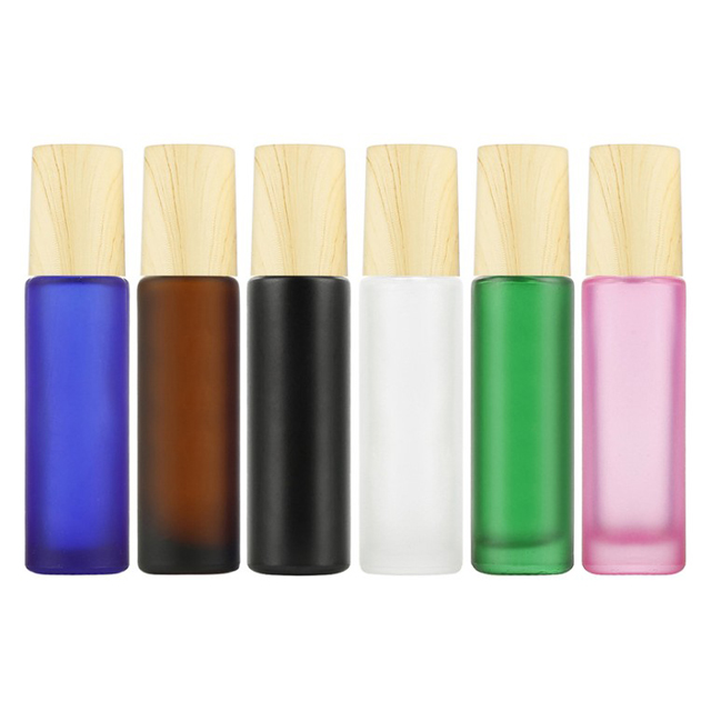 Fuyun Small quantity 10ml blue/amber/black/clear/pink bamboo cap essential oil roller glass bottle