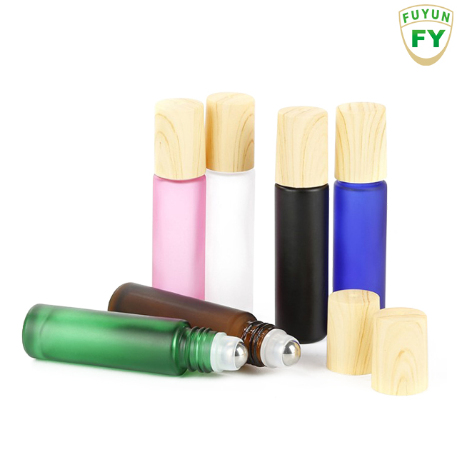 Fuyun Small quantity 10ml blue/amber/black/clear/pink bamboo cap essential oil roller glass bottle