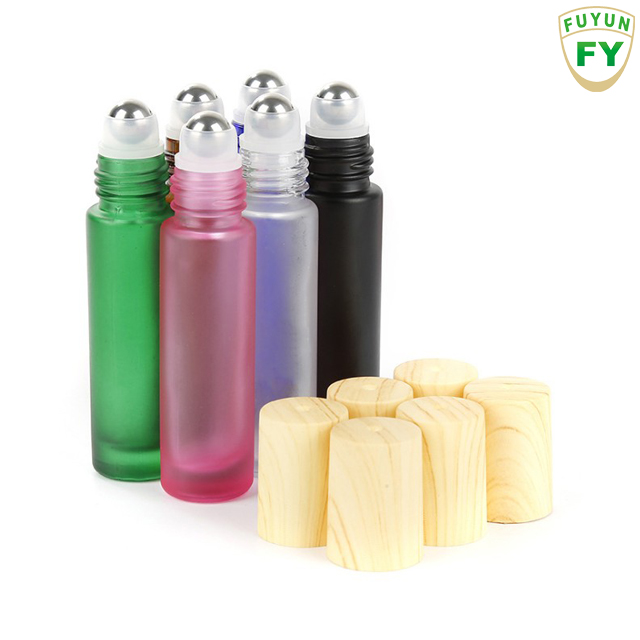 Fuyun Small quantity 10ml blue/amber/black/clear/pink bamboo cap essential oil roller glass bottle