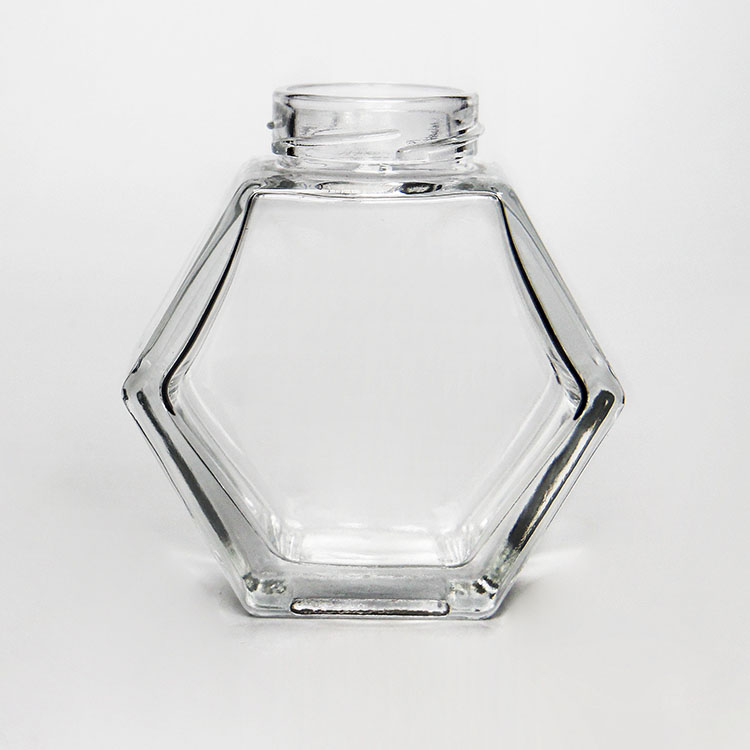Glass Storage Jar with New Design Hexagon Shape for Honey Food