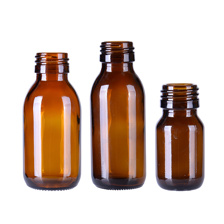 Glass amber pharmaceutical bottle with lids