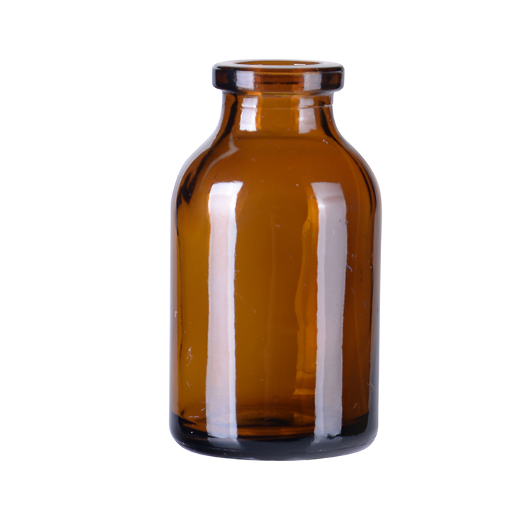 Glass amber pharmaceutical bottle with lids