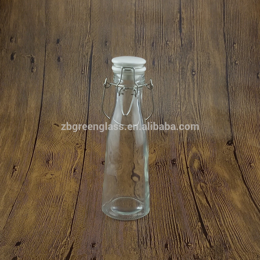 Glass bottles with ceramic hanging swing top stoppers lids for milk