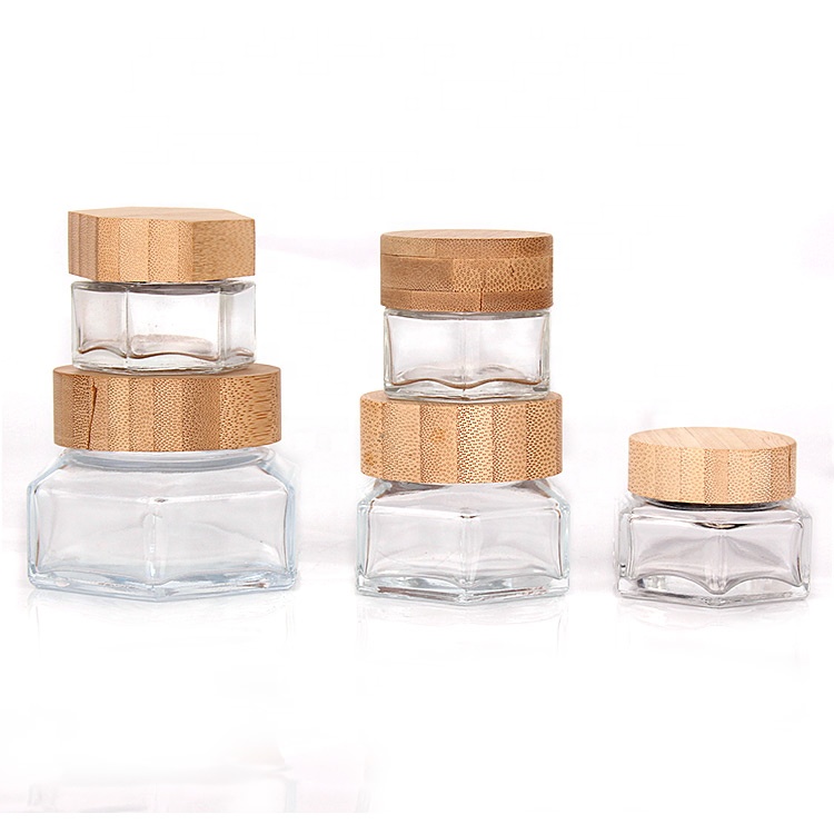 Glass container jar for cosmetic honey jam with bamboo wooden lid