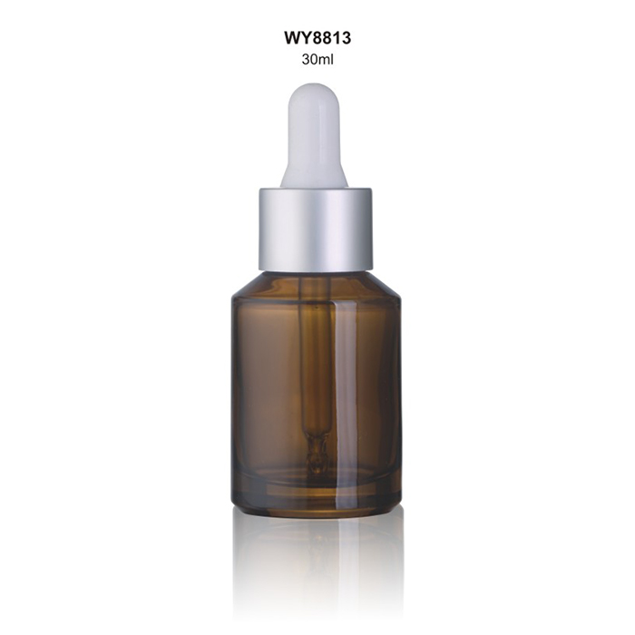 Glass dropper bottle spray amber transparent color with oblique shoulder and matte silver dropper 30ml