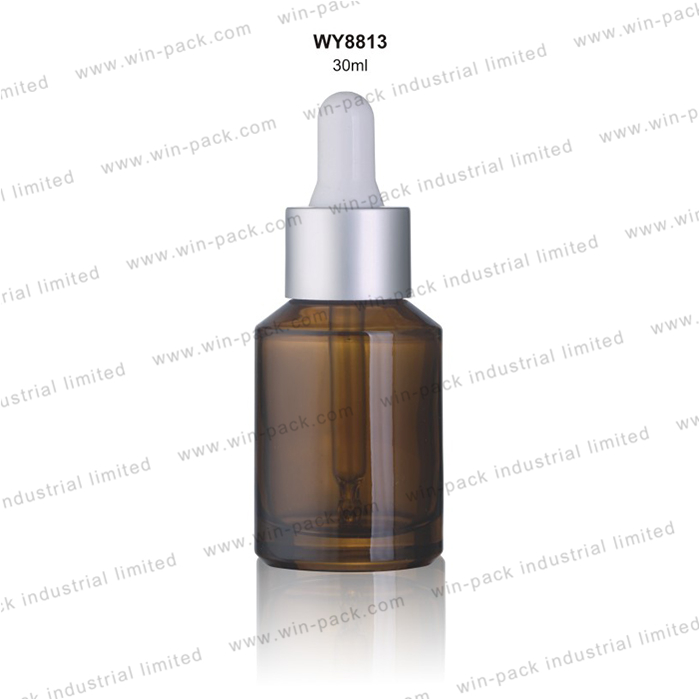 Glass dropper bottle spray amber transparent color with oblique shoulder and matte silver dropper 30ml