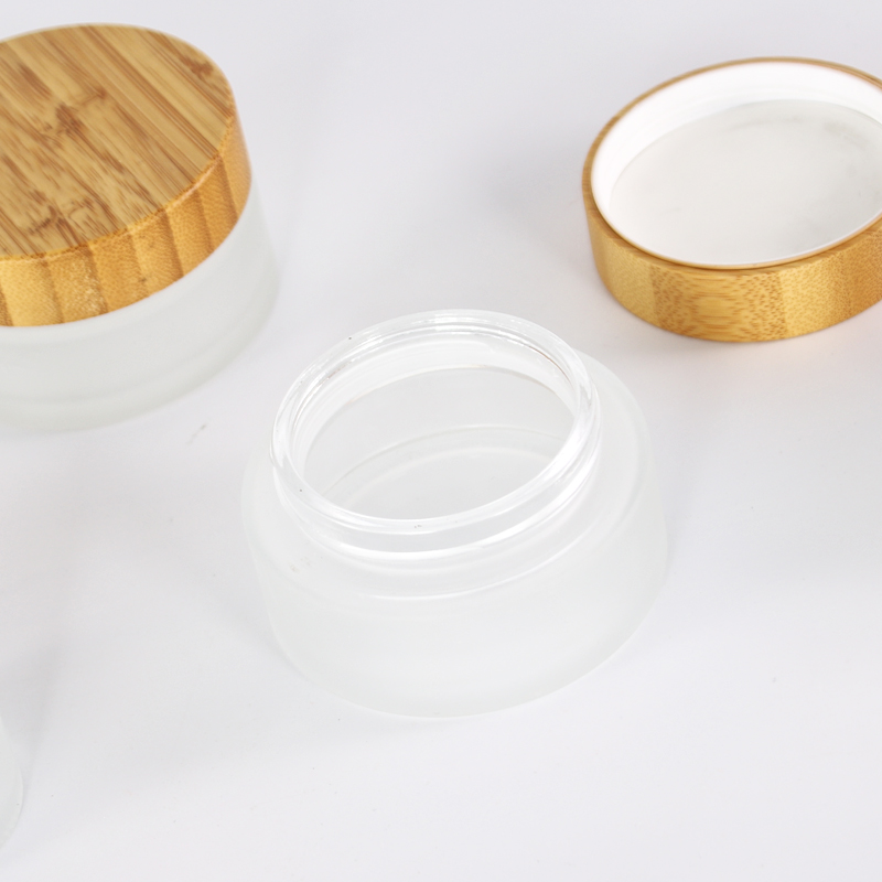 Glass jar with bamboo lid Hot Eco-friendly 5ml 15ml 30ml 50ml 100ml clear frosted glass jar with bamboo wood lid