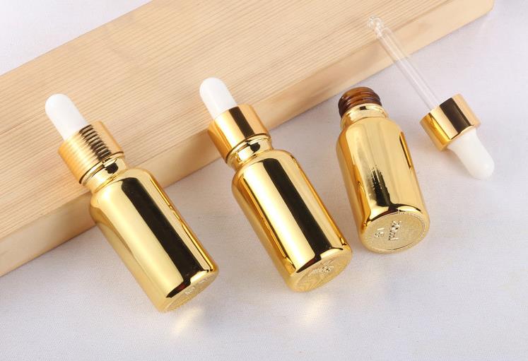 Gold bottle dropper custom logo cbd pipette oil bottles bamboo skin care serum oil use child resistant dropper jar