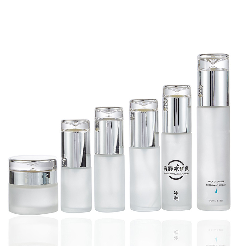 Gold lid 20g 30g 50g round clear frost empty cosmetic luxury glass face cream jar and serum bottles with pump