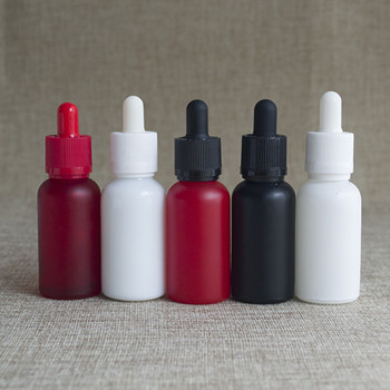 Gold stamping logo Customized 30ml matt black essential oil glass dropper bottle with aluminum cap