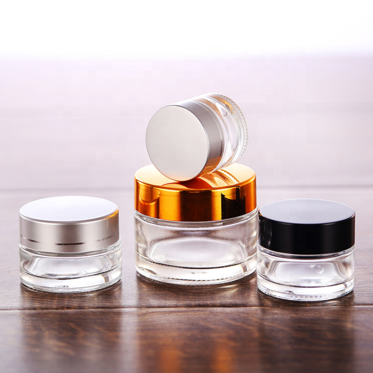 Good quality cosmetic packaging 50g glass jar 50 ml frosted clear cosmetic container glass bottle jar with matt silver lid