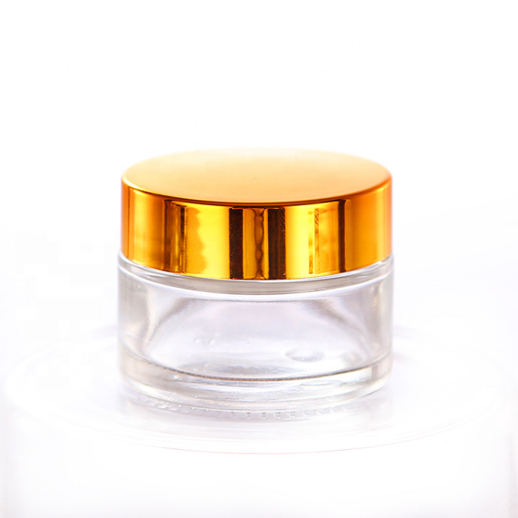 Good quality cosmetic packaging 50g glass jar 50 ml frosted clear cosmetic container glass bottle jar with matt silver lid
