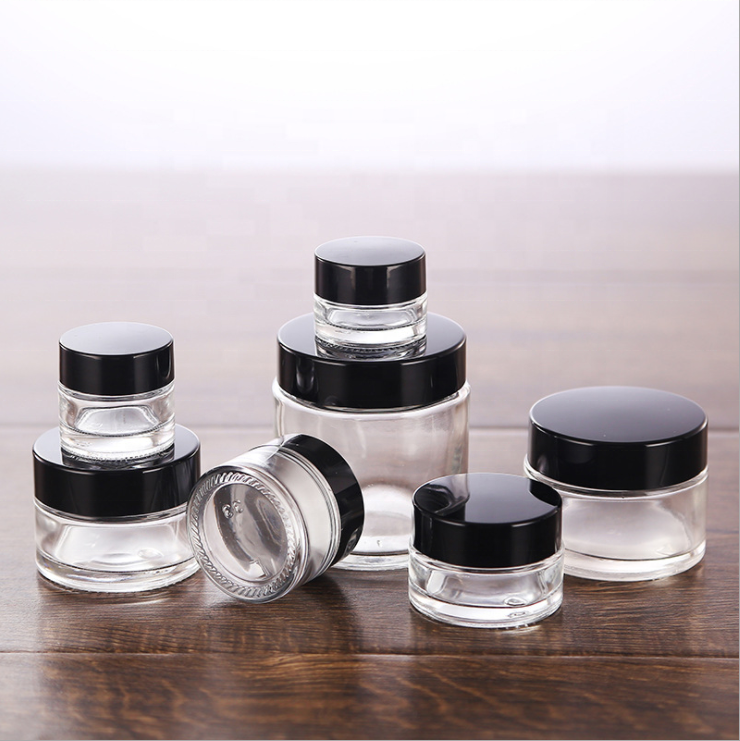 Good quality cosmetic packaging 50g glass jar 50 ml frosted clear cosmetic container glass bottle jar with matt silver lid