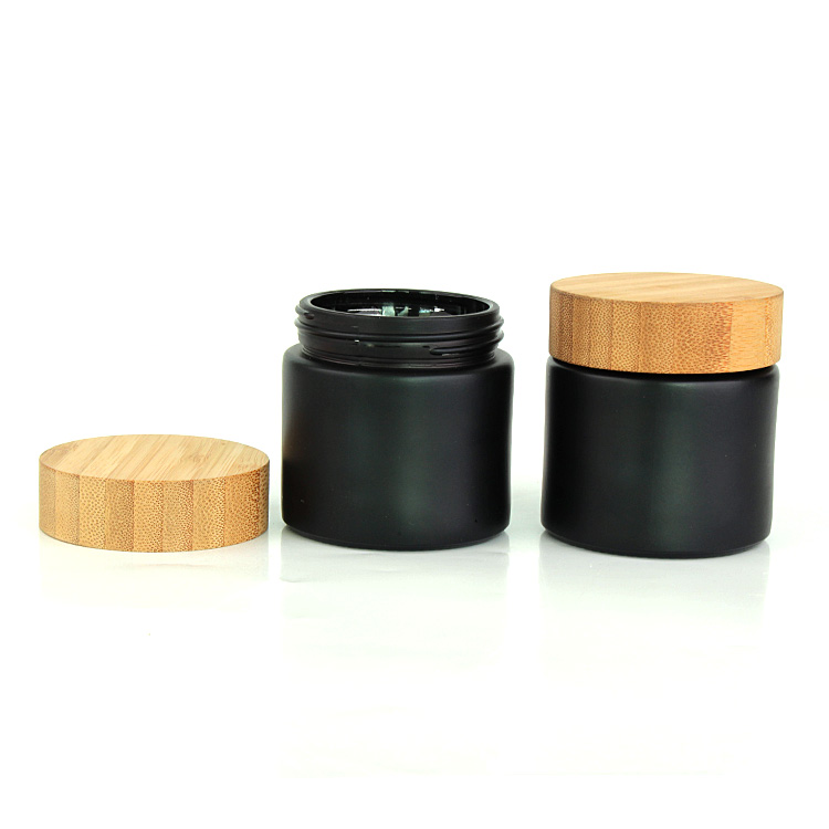 Good quality hot selling black round glass storage jar container with wooden lid