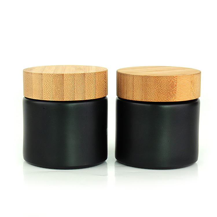 Good quality hot selling black round glass storage jar container with wooden lid