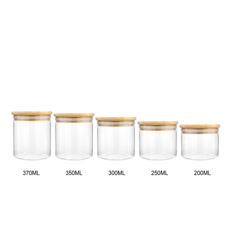 Guangdong 30 50 80 100 ml cylindrical empty container big spice kitchen borosilicate glass jar set with bamboo lid