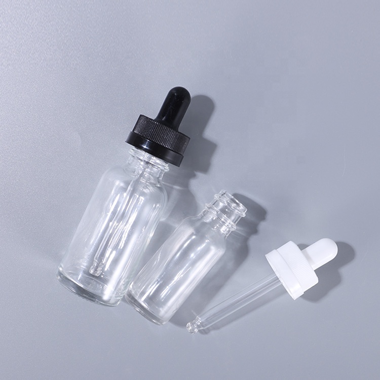 Guangzhou factory 1 oz 30ml clear empty boston round glass bottle with dropper for CBD oil