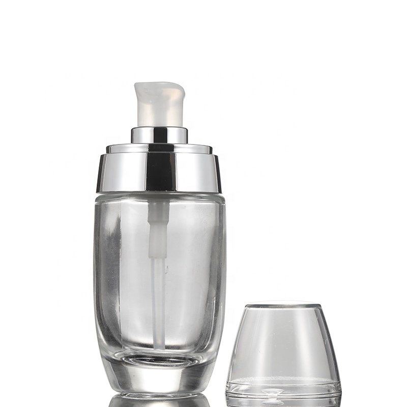 Guangzhou factory custom empty unique egg shape 30ml glass bottle wholesale with pump spray