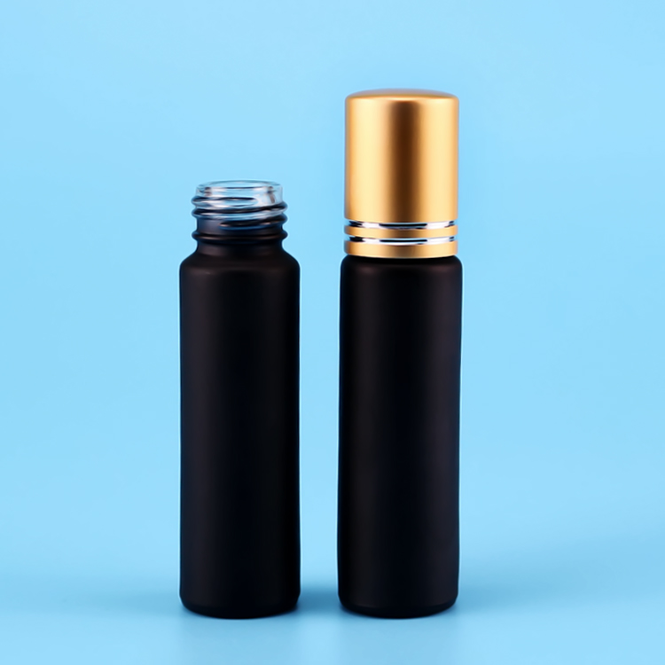 Guangzhou factory high quality easy for carrying frosted black colored 10ml glass essential oil bottle with colorful gem stone