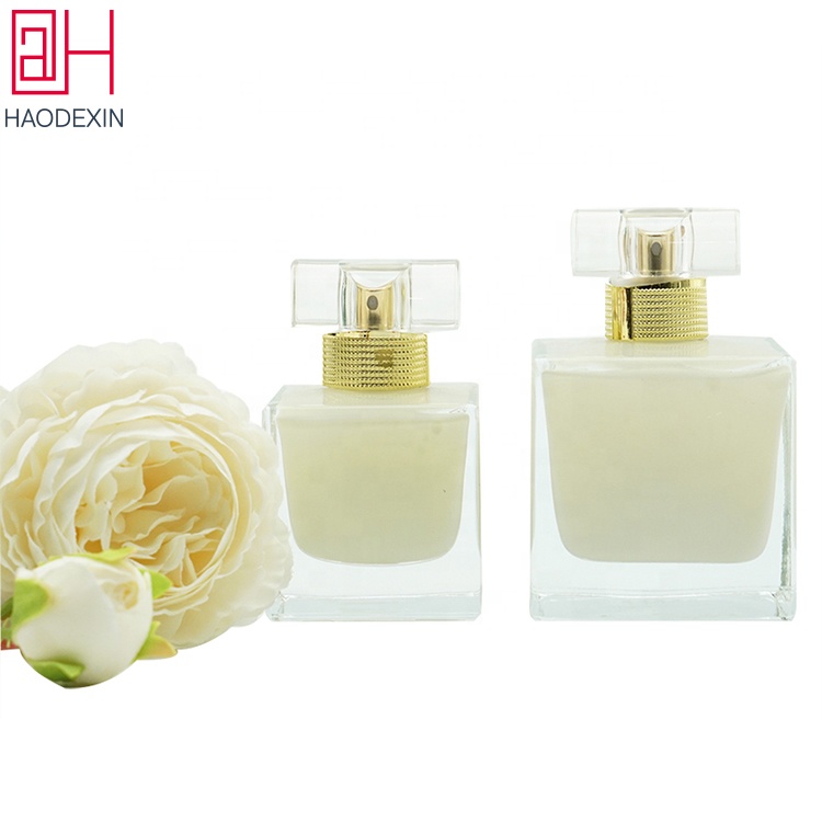 HAODEXIN empty cube thick bottom glass square 50ml 100ml perfume bottles custom colors label wholesale pump sprayer manufacturer