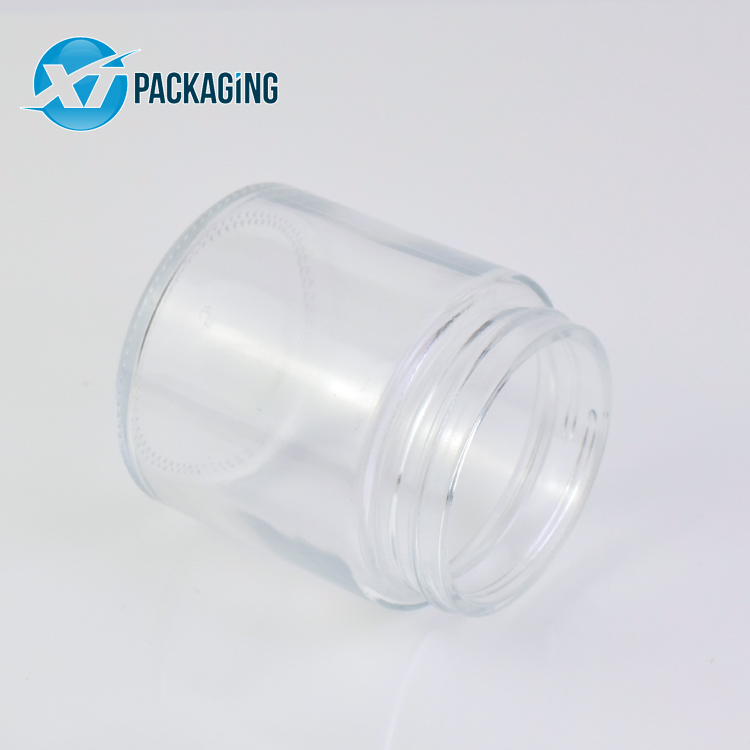 HOT 1oz 2oz 3oz 4oz Wholesale customized high quality small round straight sided clear glass jars with plastic CR lid