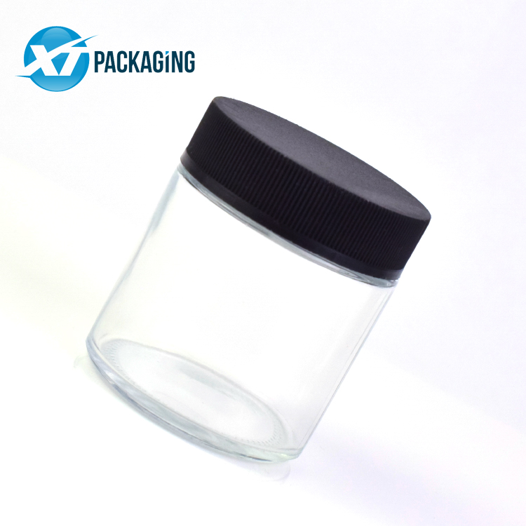 HOT 1oz 2oz 3oz 4oz Wholesale customized high quality small round straight sided clear glass jars with plastic CR lid