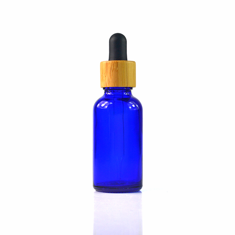 HOT SALES 5ml 10ml 15ml 30ml 50ml 100ml clear amber blue green glass dropper bottle with bamboo cap