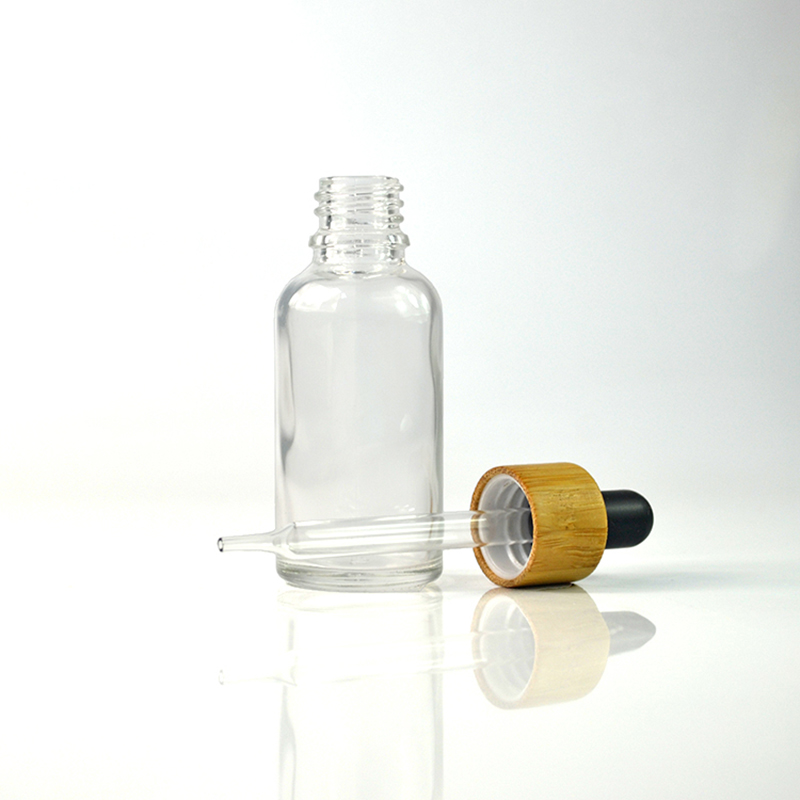 HOT SALES 5ml 10ml 15ml 30ml 50ml 100ml clear amber blue green glass dropper bottle with bamboo cap
