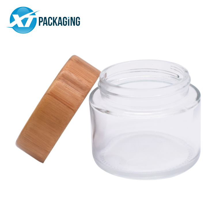 HOT SELLING 2oz 4oz glass jar cosmetics packaging bamboo lid face cream container glass cream jar with wooden cap