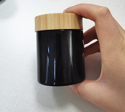 HOT SELLING empty screw small glass jar in bulk with black child resistant lid CR lid flower packaging black glass jar