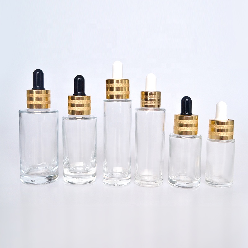 HOT sale luxury flat shoulder Cosmetics 30ml 50ml 60ml 100ml  clear essential oil glass dropper bottle with gold cap