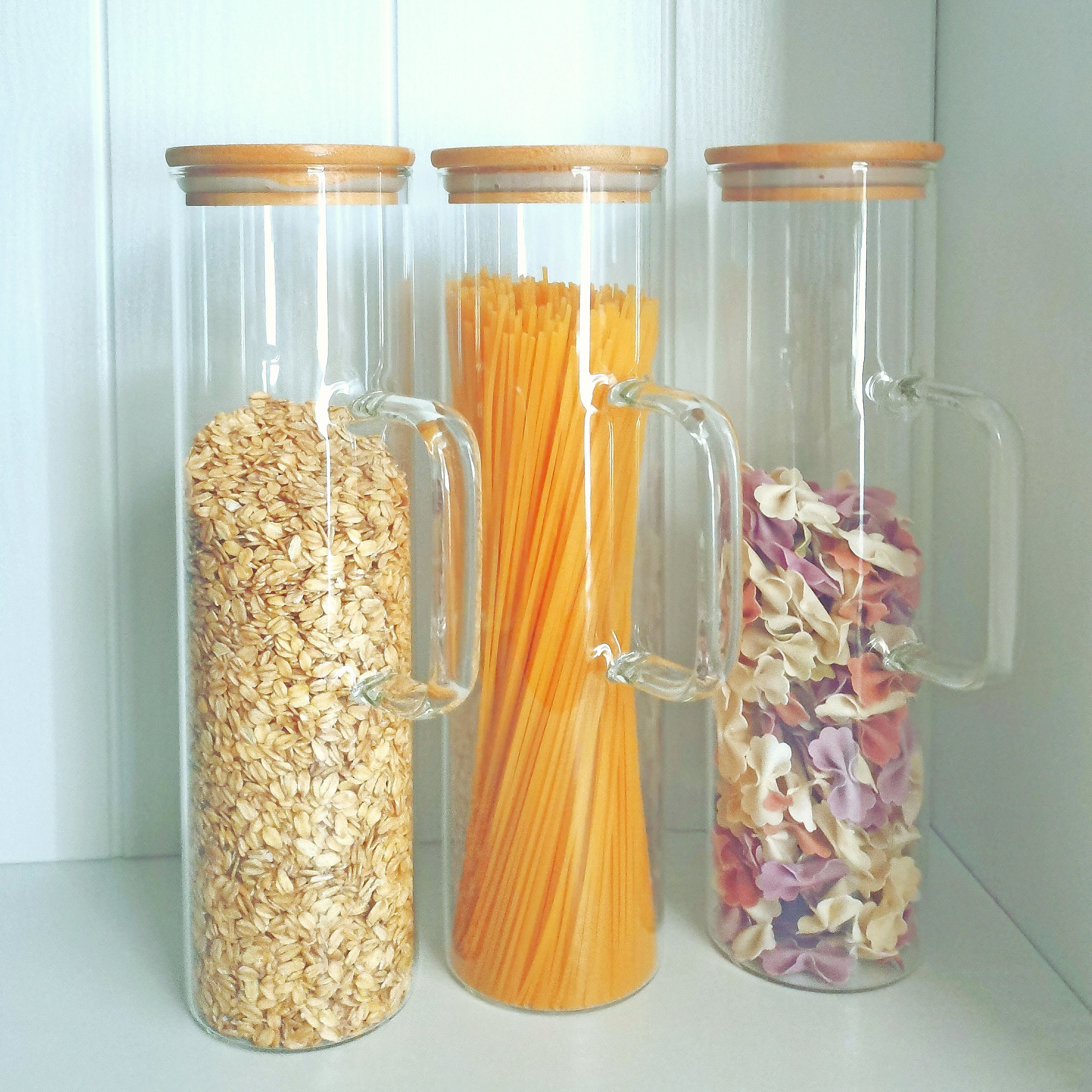 Hand blown borosilicate glass kitchen canister for spaghetti