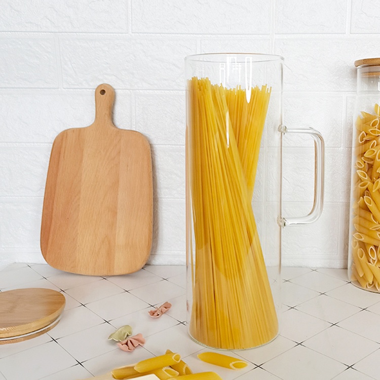 Hand blown borosilicate glass kitchen canister for spaghetti