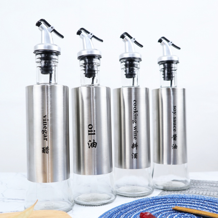 Healthy material 300ml prevent dripping kitchen storage glass bottle with stainless steel sleeve