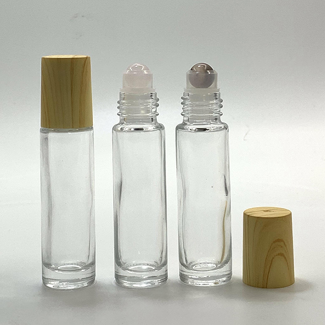 Hengjian 10ml Natural Gemstone Roller Ball Bottle Clear Glass Perfume Essential Oil Bottle With Plastic Bamboo Pattern Cap