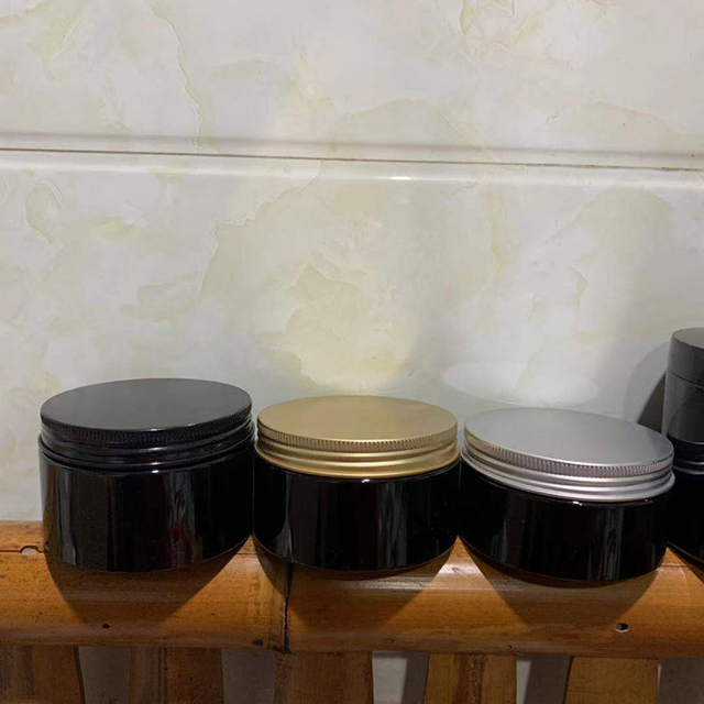 Hengjian 150g 200g 250g 300g 350g 400g 500g cosmetic storage container black plastic skincare cream jar with silver gold cap