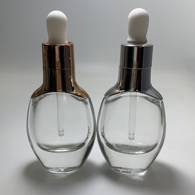 Hengjian 30ml cosmetic essential oil clear flat shape glass dropper bottle with silver gold cap for massage oil