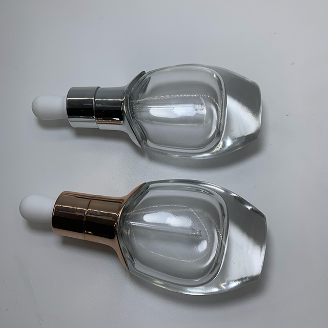 Hengjian 30ml cosmetic essential oil clear flat shape glass dropper bottle with silver gold cap for massage oil