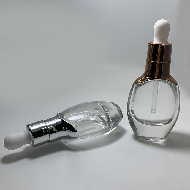 Hengjian 30ml cosmetic essential oil clear flat shape glass dropper bottle with silver gold cap for massage oil