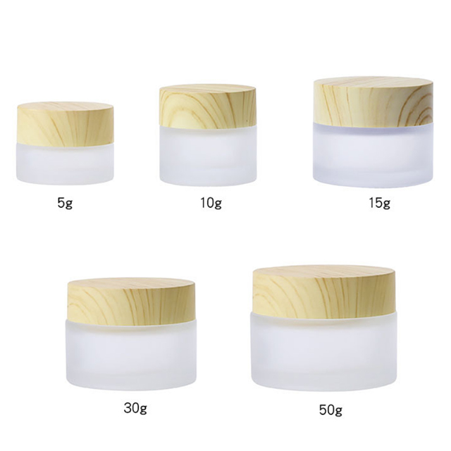 Hengjian 50g Empty Cosmetic Packaging Clear Frost Glass Skin Care Cream Jar With Plastic Wooden Pattern Lid