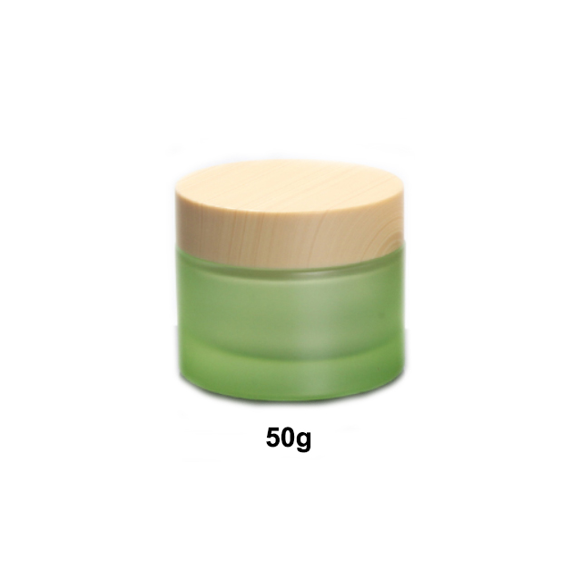 Hengjian have stock 50g 30g 20g 10g 5g matt green glass cosmetics jar with plastic cap in bamboo printing color for cream