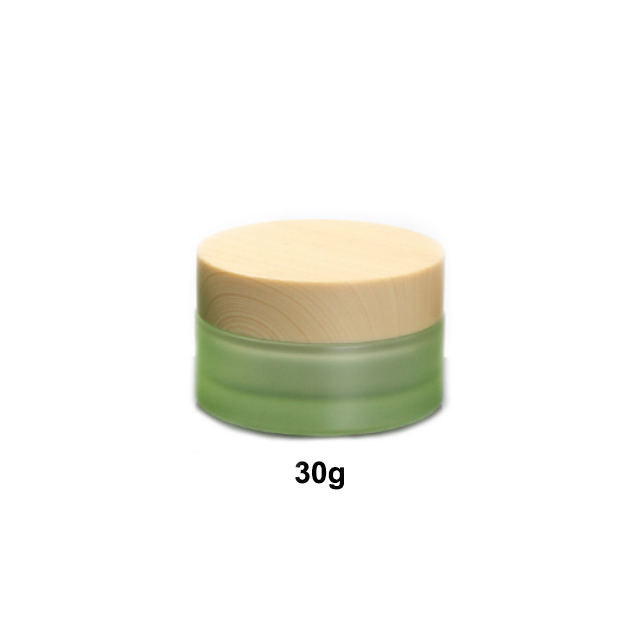 Hengjian have stock 50g 30g 20g 10g 5g matt green glass cosmetics jar with plastic cap in bamboo printing color for cream