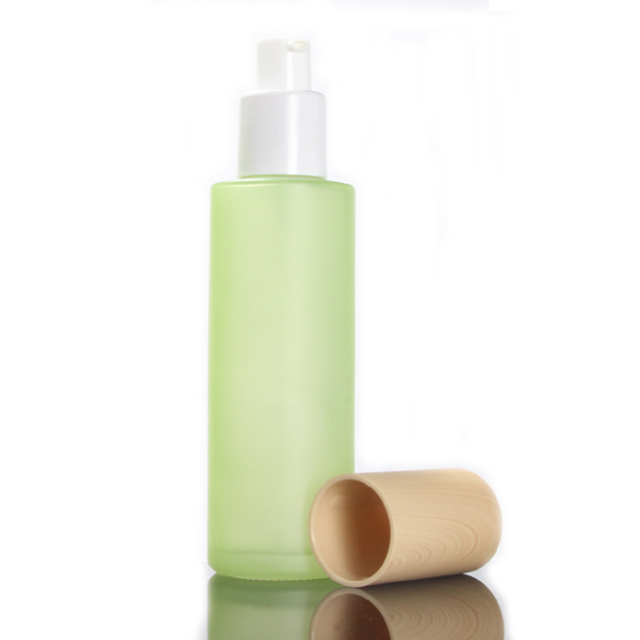 Hengjian have stock 50g 30g 20g 10g 5g matt green glass cosmetics jar with plastic cap in bamboo printing color for cream