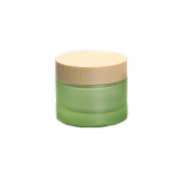 Hengjian have stock 50g 30g 20g 10g 5g matt green glass cosmetics jar with plastic cap in bamboo printing color for cream