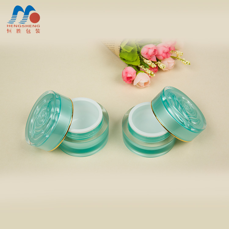 Hengsheng manufacturer hot sale cylinder green color acrylic cream jar with flower decorative lid 5g 10g 15g 25g 30g 50g