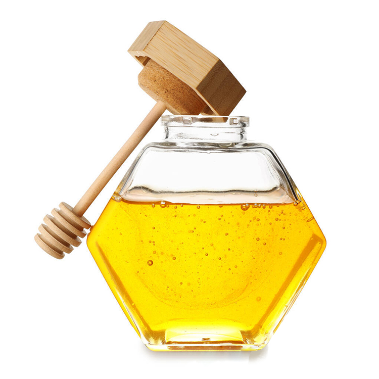 Hexagonal honey glass bottle with stirring rod and wooden cover sealed jar honey packing bottle
